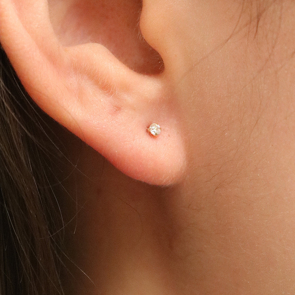 Four prong White Topaz studs-1